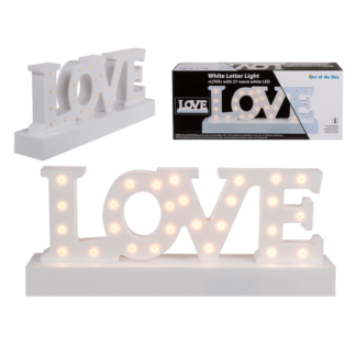 White plastic letter light, Love,